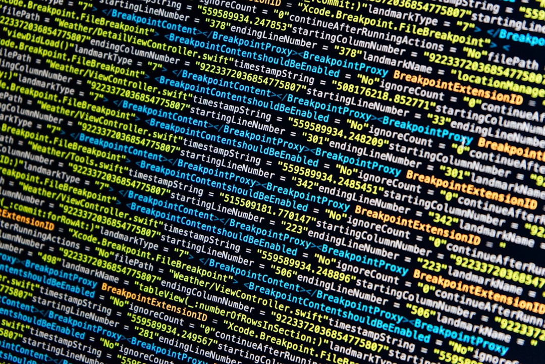 A magnifying glass over lines of code on a screen, representing the need to scrutinize software algorithms