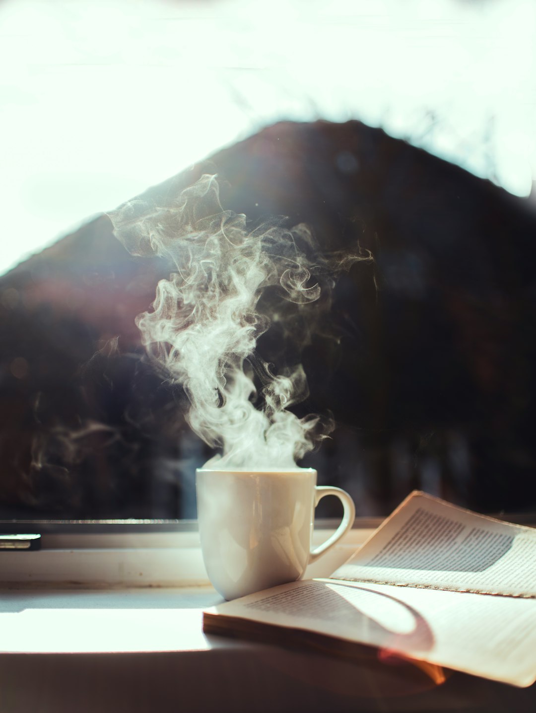 Coffee and journal on windowsill showing calm morning readiness routine