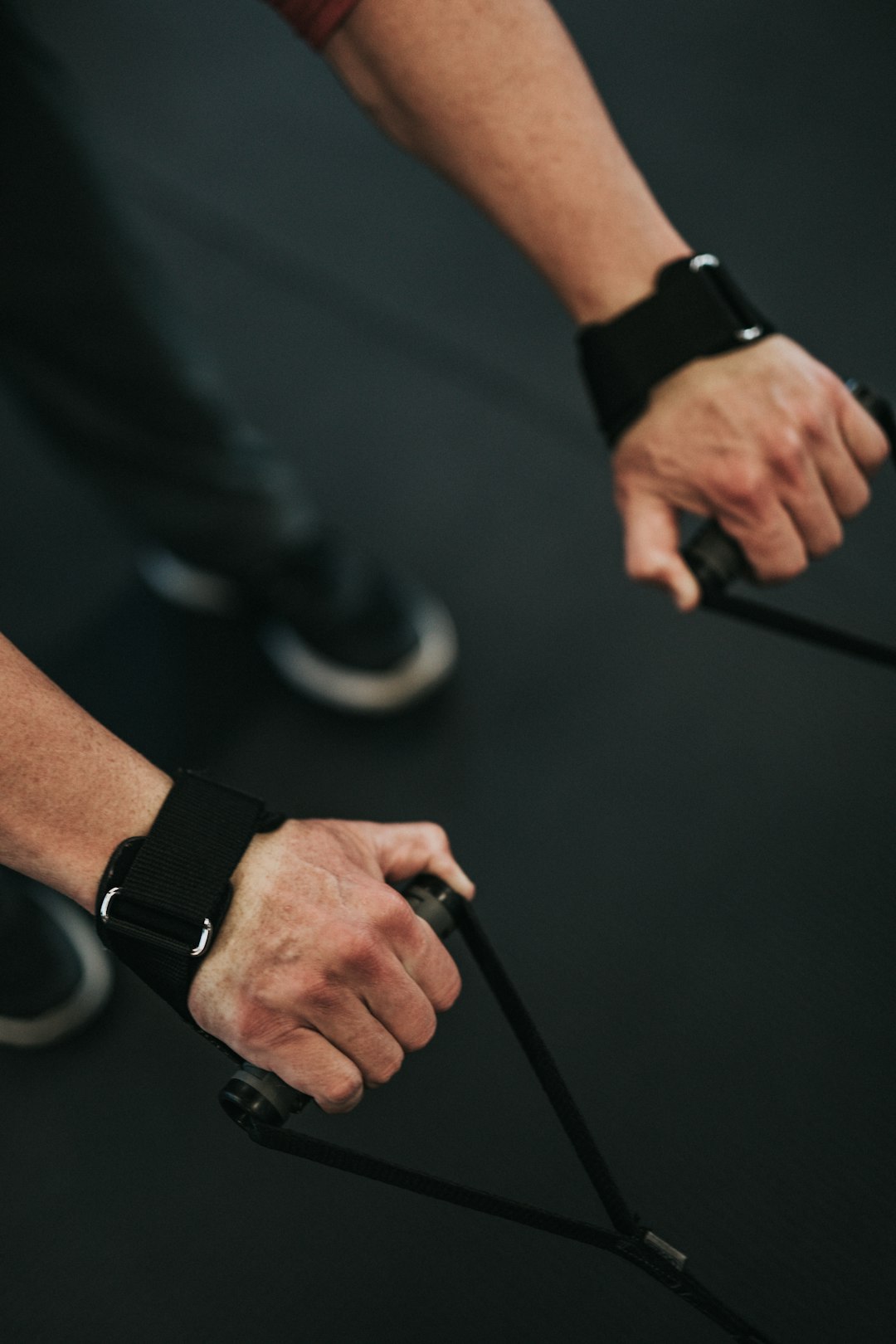 Close-up of a wrist wearable during training, showing screenless band style use