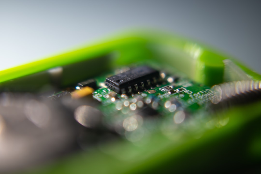 Green LED PPG sensor macro shot showing the light source and photodetector arrangement common in wearables